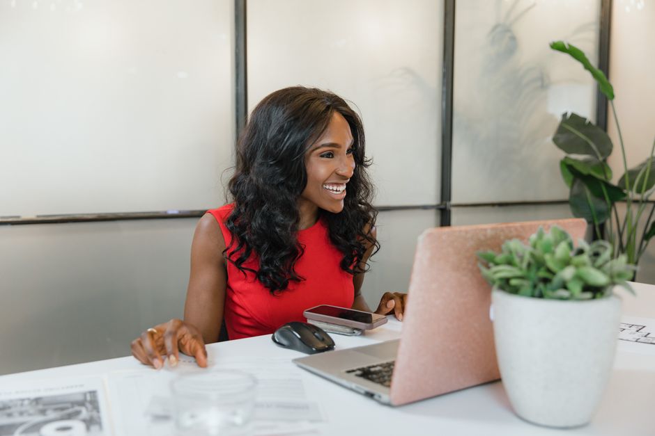 A business owner with her time back, working calmly